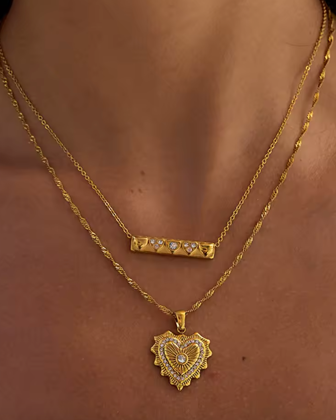 heart pendant necklace worn layered – model shot